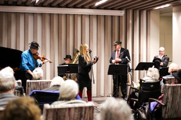 Maxwell Street Klezmer Band playing for a crowd at The Selfhelp Home